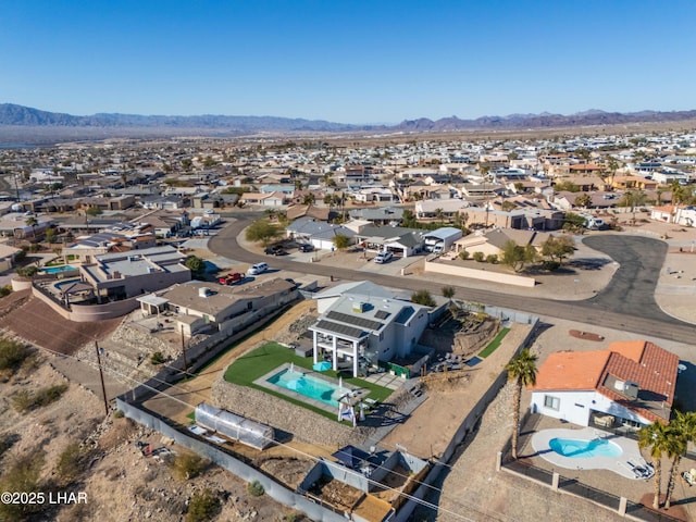 bird's eye view with a mountain view