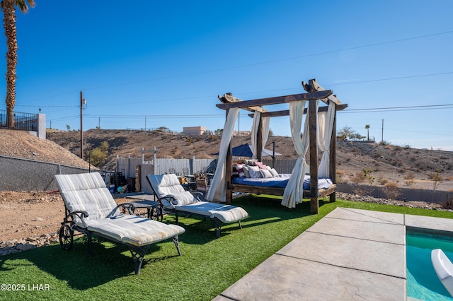 view of yard with a fenced in pool and a patio area