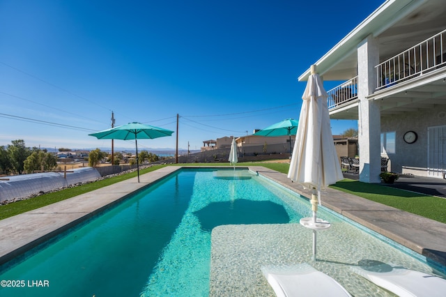 view of pool with a patio