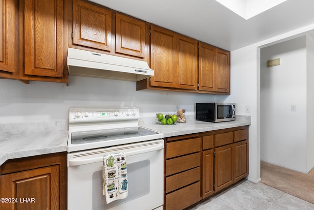 kitchen featuring white electric range