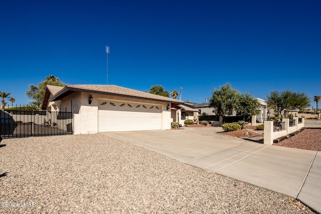 ranch-style home with a garage