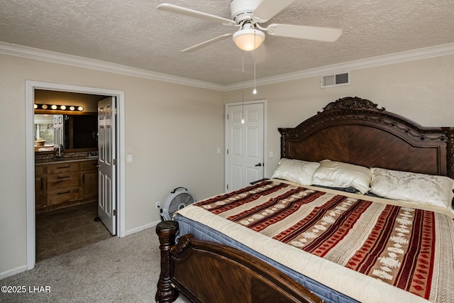 bedroom with ceiling fan, ornamental molding, carpet, and a textured ceiling