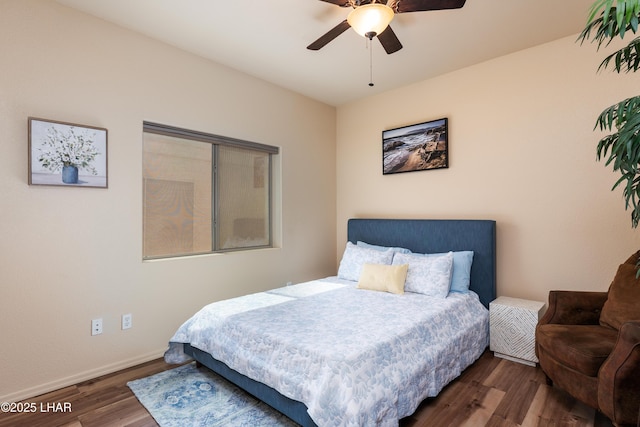 406 Noland Ct, Lake Havasu City, AZ 86403 - bedroom featuring wood finished floors, baseboards, and a ceiling fan