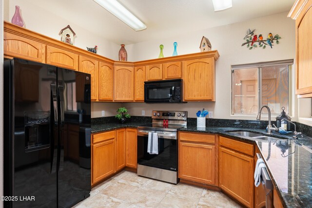 406 Noland Ct, Lake Havasu City, AZ 86403 - kitchen with black appliances, a sink, dark stone countertops, and brown cabinetry