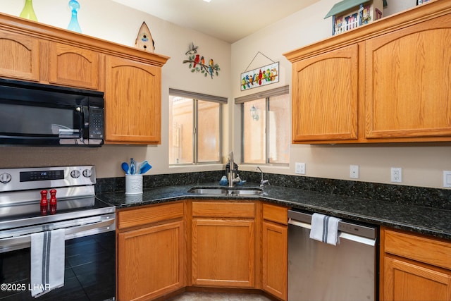 406 Noland Ct, Lake Havasu City, AZ 86403 - kitchen featuring appliances with stainless steel finishes, a sink, and dark stone countertops