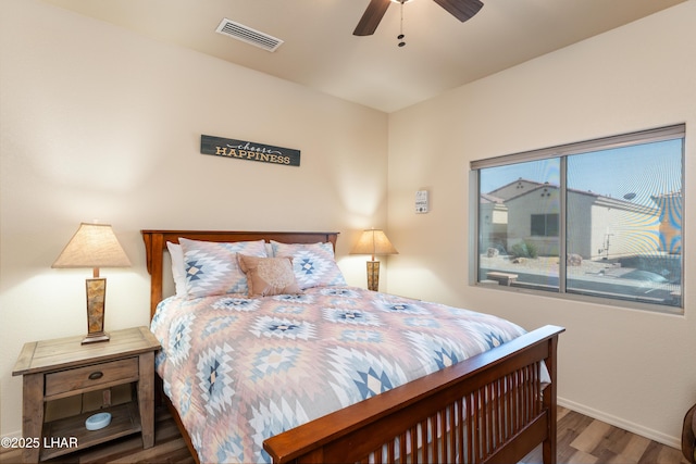 406 Noland Ct, Lake Havasu City, AZ 86403 - bedroom featuring wood finished floors, baseboards, and ceiling fan