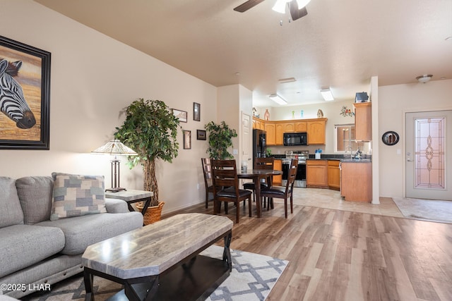 406 Noland Ct, Lake Havasu City, AZ 86403 - living area with light wood-style floors and a ceiling fan