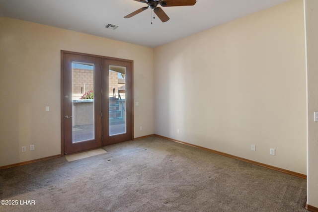 2620 Via Palma, Lake Havasu City, AZ 86406 - spare room featuring french doors, carpet floors, and a ceiling fan