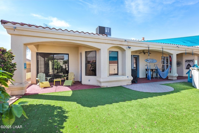 2620 Via Palma, Lake Havasu City, AZ 86406 - back of house with a patio, a yard, and stucco siding