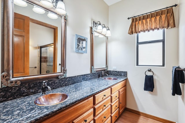 2620 Via Palma, Lake Havasu City, AZ 86406 - full bath with double vanity, an enclosed shower, and wood finished floors