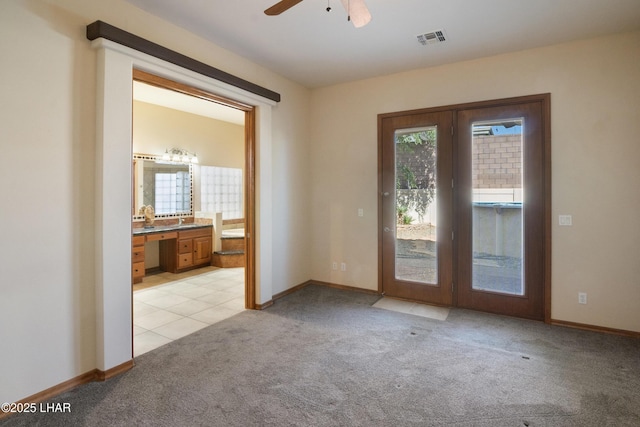 2620 Via Palma, Lake Havasu City, AZ 86406 - spare room with light colored carpet, ceiling fan, a desk, and french doors