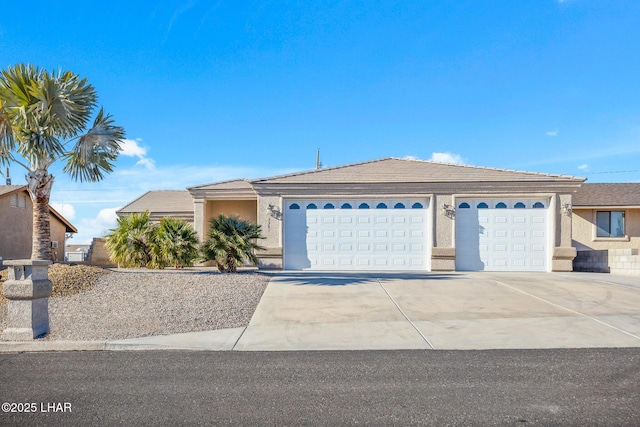 ranch-style house featuring a garage