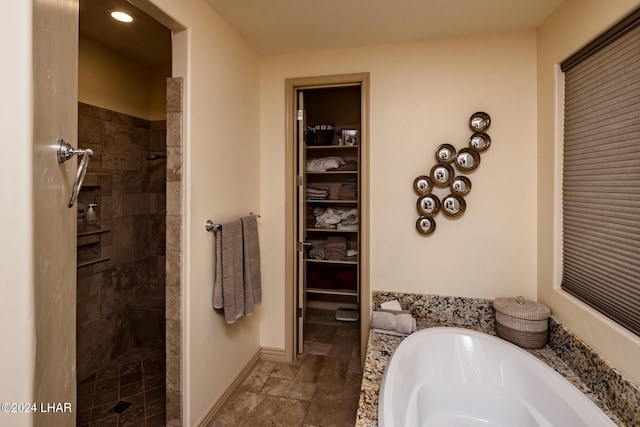 bathroom with independent shower and bath