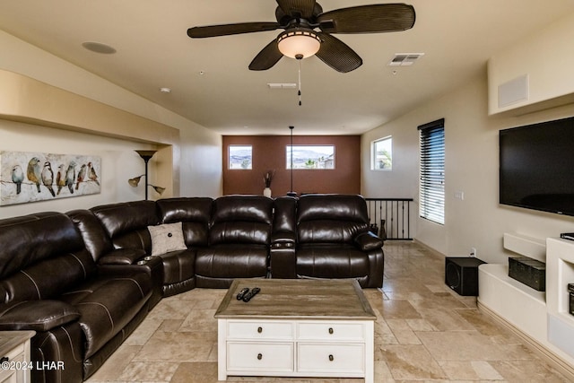 living room with ceiling fan