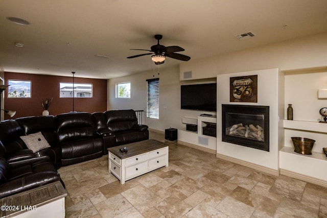 living room featuring ceiling fan