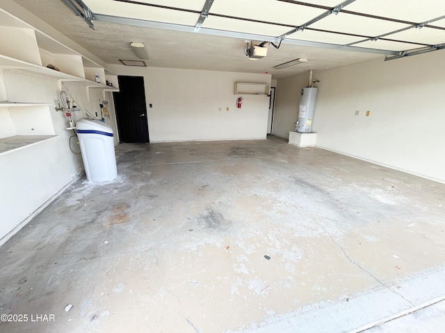 garage featuring a garage door opener and water heater