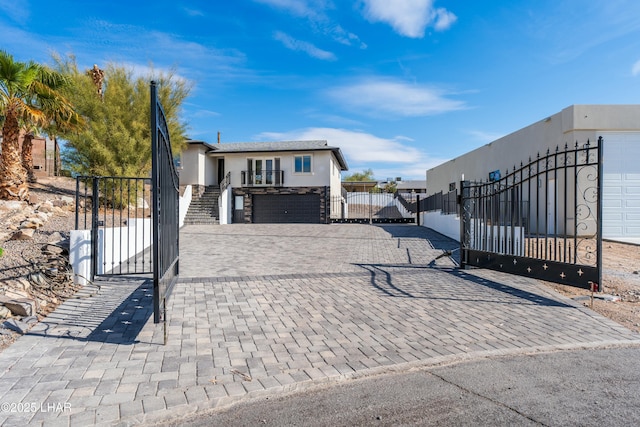 view of gate featuring a fenced front yard