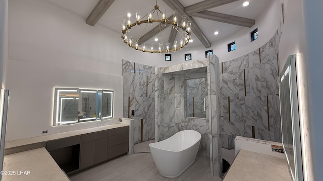 6724 Corte De Los Bueyes, Lake Havasu City, AZ 86404 - bathroom featuring beam ceiling, a freestanding tub, a marble finish shower, a chandelier, and vanity