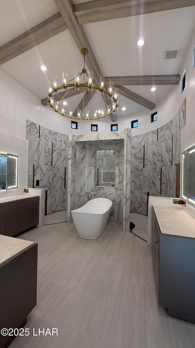 6724 Corte De Los Bueyes, Lake Havasu City, AZ 86404 - bathroom featuring tile walls, a marble finish shower, a chandelier, a soaking tub, and vanity