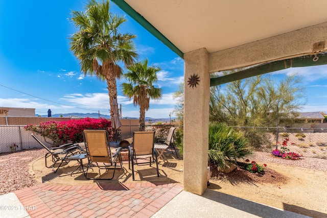 view of patio / terrace featuring outdoor dining space and a fenced backyard