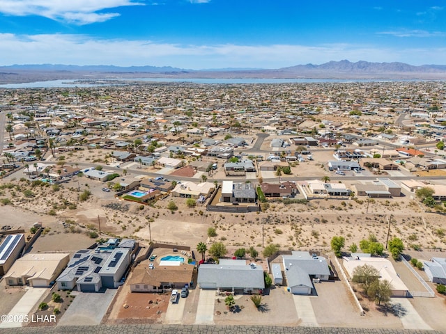 aerial view featuring a mountain view and a residential view