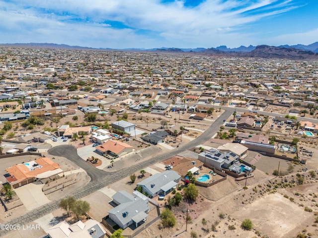 drone / aerial view with a mountain view and a residential view