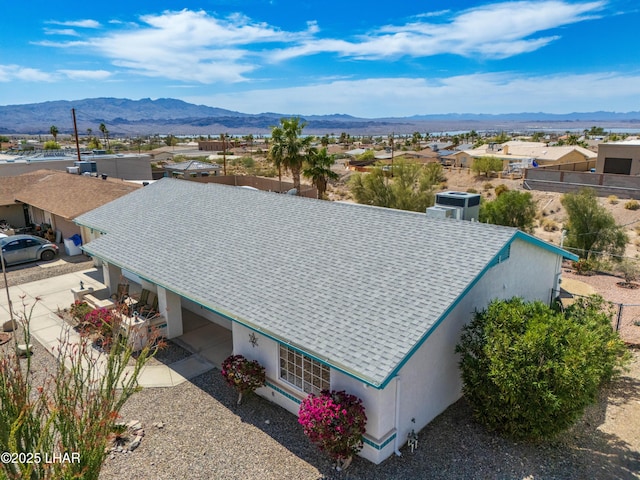 aerial view featuring a mountain view and a residential view