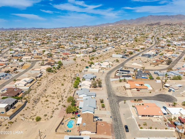 aerial view featuring a mountain view and a residential view