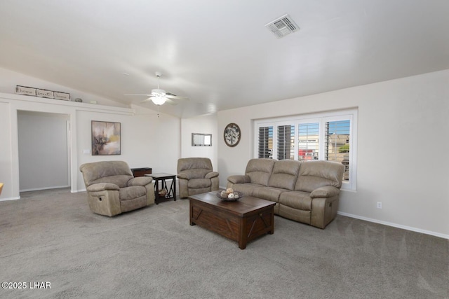 carpeted living area with visible vents, baseboards, lofted ceiling, and ceiling fan