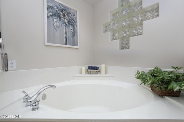 bathroom featuring a garden tub