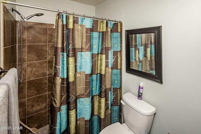 full bathroom with toilet and curtained shower