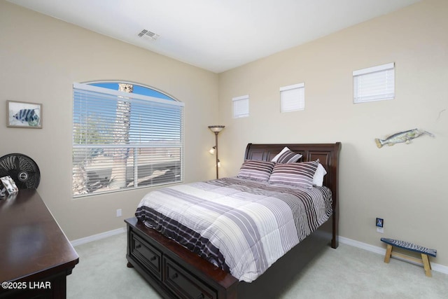 bedroom with light carpet