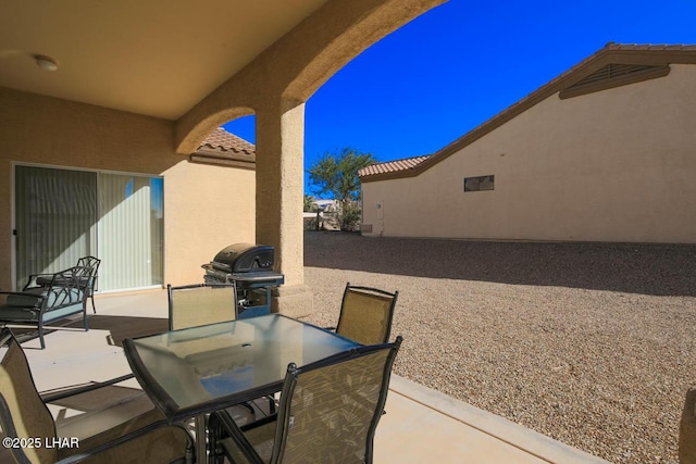 view of patio with area for grilling