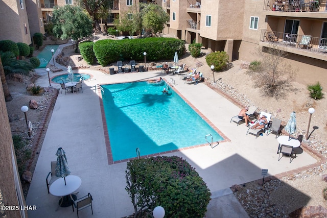 pool with a patio area