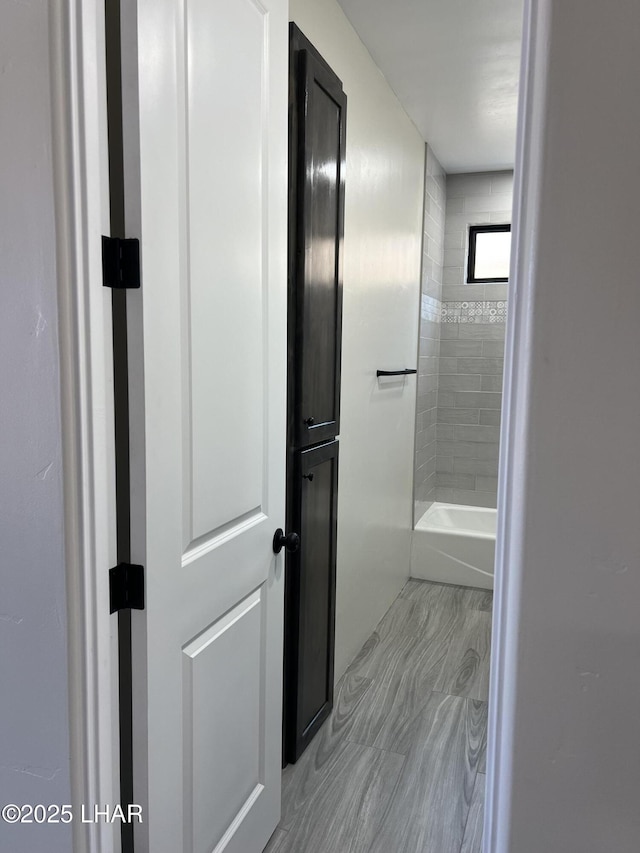 bathroom with shower / bath combination