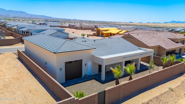 4801 N Diana Ave, Lake Havasu City, AZ 86404 - view of front of house featuring a residential view, stucco siding, and a mountain view