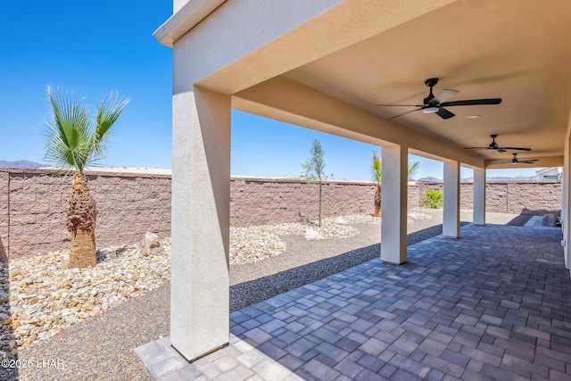 4801 N Diana Ave, Lake Havasu City, AZ 86404 - fenced backyard with ceiling fan and a patio