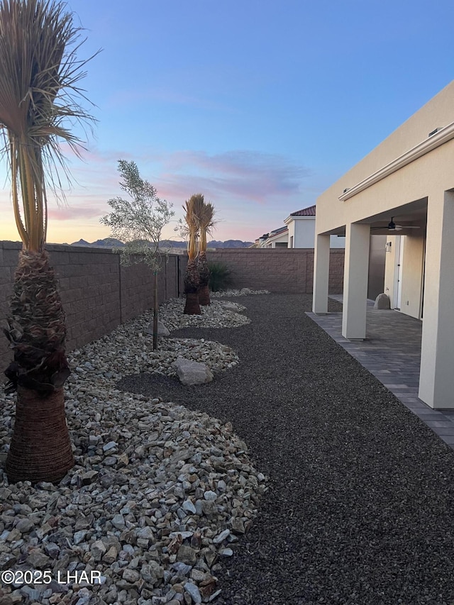 view of yard with a patio and a fenced backyard