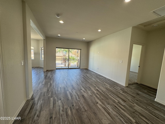 interior space with dark hardwood / wood-style floors