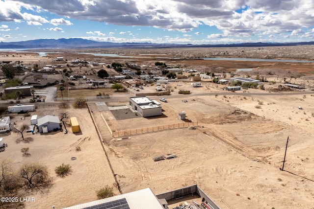 drone / aerial view featuring a mountain view