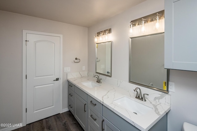 bathroom with vanity and hardwood / wood-style floors