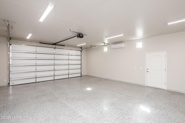 garage featuring a garage door opener and a wall mounted air conditioner