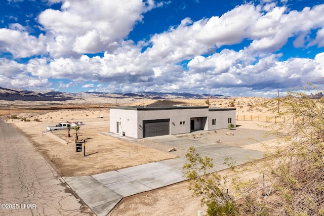 view of outbuilding featuring a mountain view