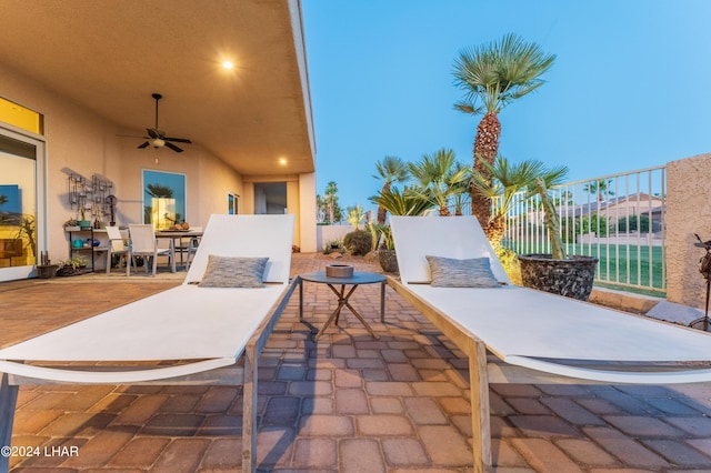 view of patio featuring ceiling fan