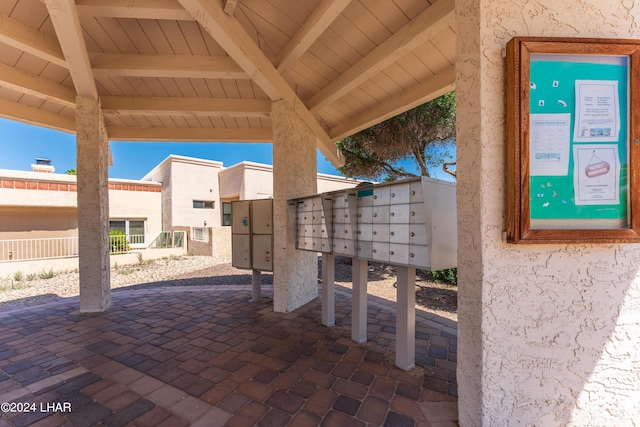 view of home's community featuring a mail area