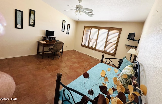 bedroom featuring baseboards, visible vents, a ceiling fan, and tile patterned floors