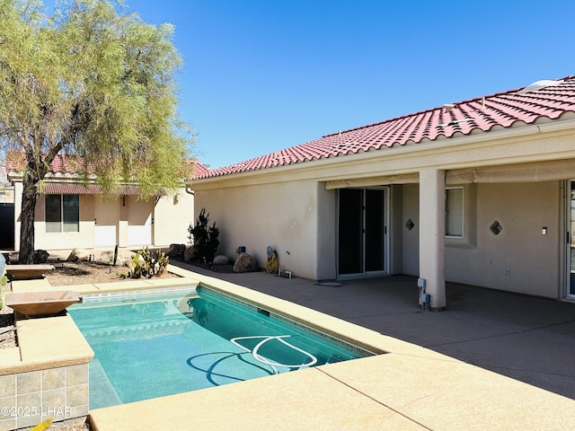 pool with a patio