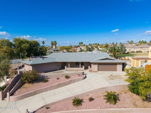 ranch-style house featuring a garage