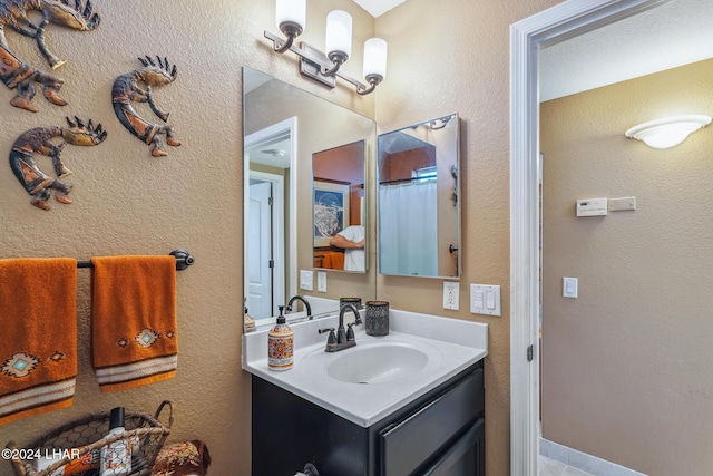 full bathroom featuring vanity