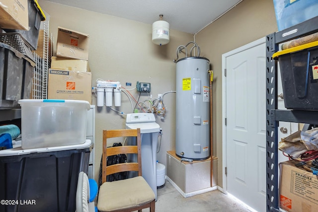 utility room with water heater